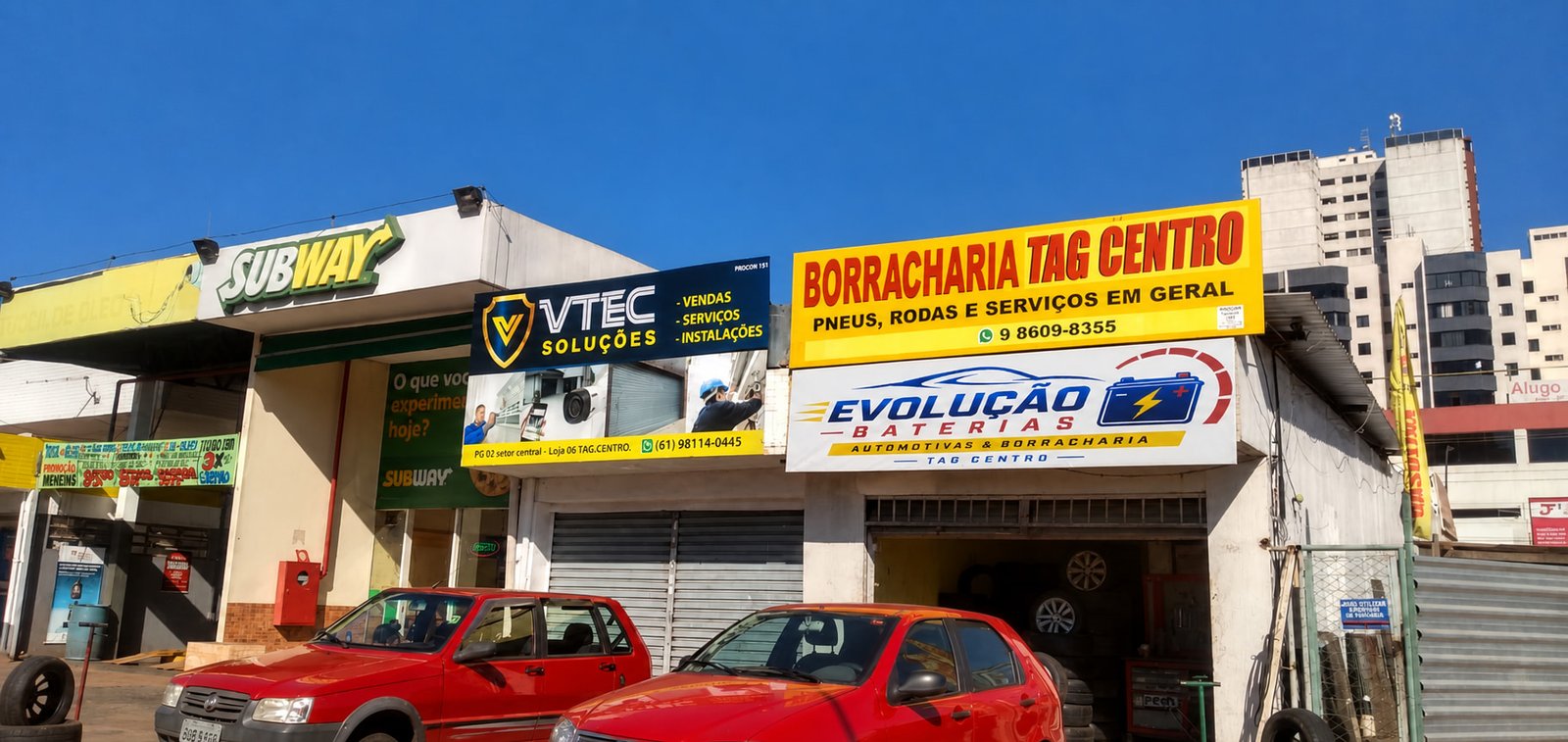 Fachada atualizada da Evolução Baterias e Borracharia em Taguatinga Centro com o novo banner